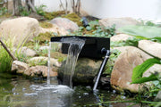 Try to hide the pipelines (passing through pipes or buckets from the pool edge).